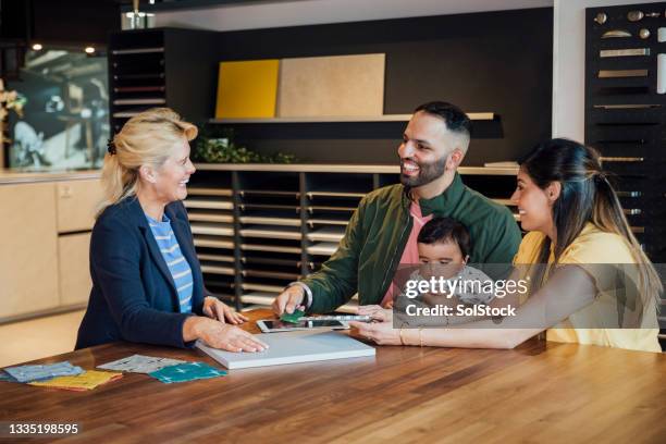 family making contactless payment - home fashion show stock pictures, royalty-free photos & images