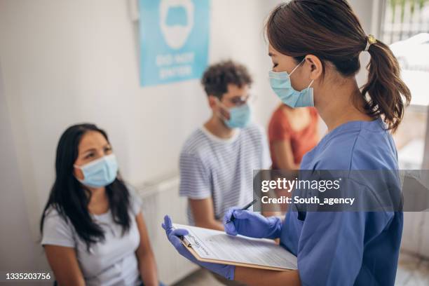 waiting room at vaccination center - frontline worker stock pictures, royalty-free photos & images