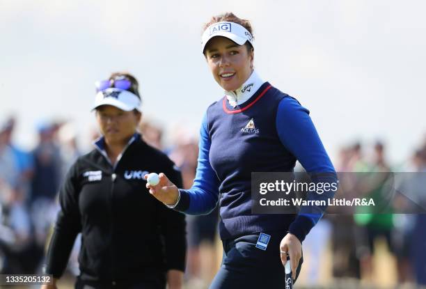 Georgia Hall of England acknowledges the crowd on the 18th green during Day Two of the AIG Women's Open at Carnoustie Golf Links on August 20, 2021...