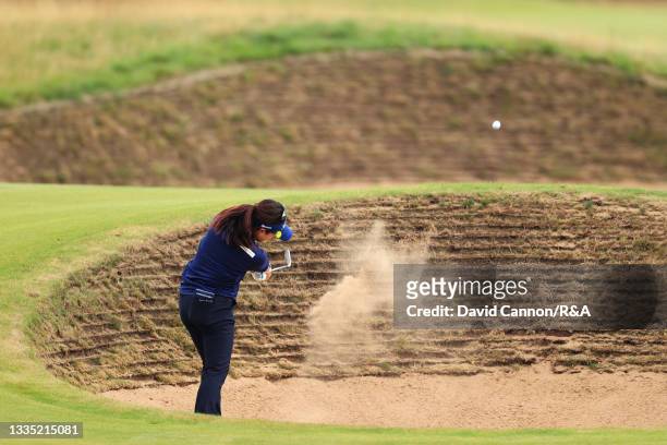 Serena Aoki of Japan plays her second shot on the fourteenth hole from a bunker during Day Two of the AIG Women's Open at Carnoustie Golf Links on...