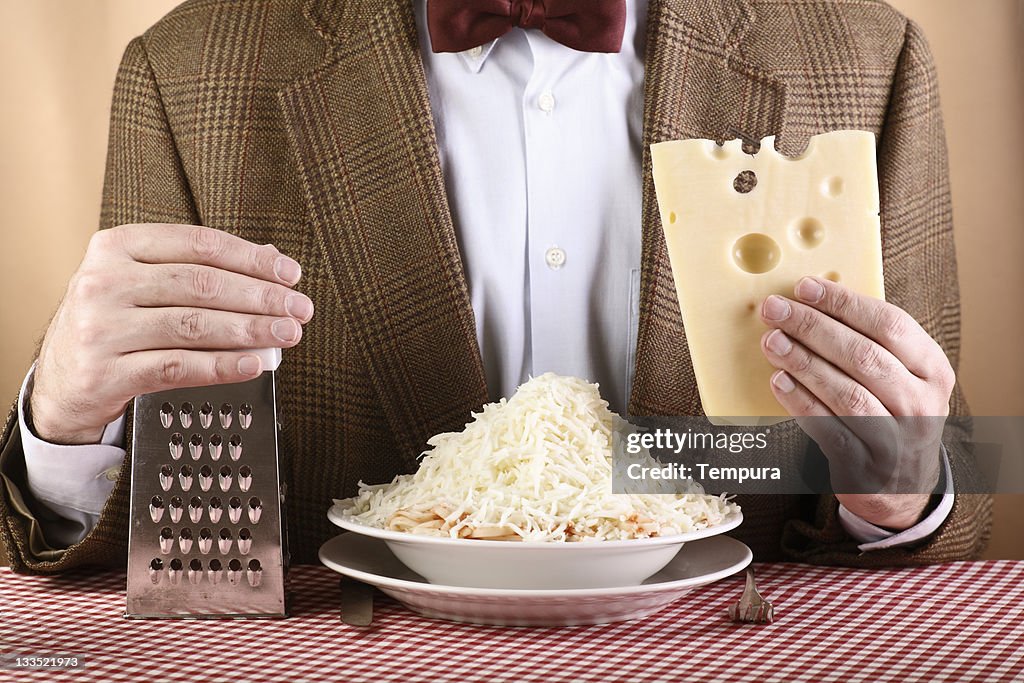 Nerdish cheese lover on brown background _ horizontal