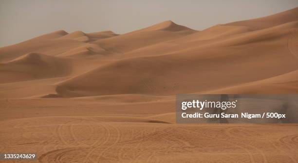 scenic view of desert against clear sky,mumbai,maharashtra,india - sand art in india stock-fotos und bilder