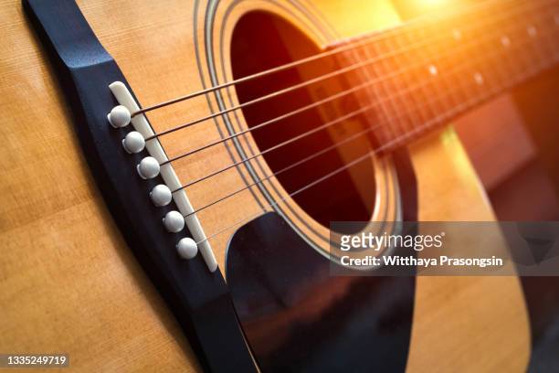 detail of classic guitar with shallow depth of field - country and western music stock pictures, royalty-free photos & images