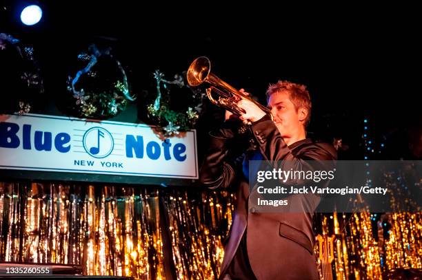 American Jazz musician Chris Botti plays trumpet as he performs with his band during his annual two-week holiday residency at the Blue Note, New...