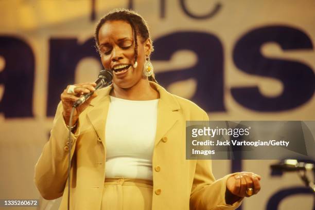 American Jazz singer Dianne Reeves performs at the Panasonic Village Jazz Festival in Washington Square Park, New York, New York, August 25, 1997.