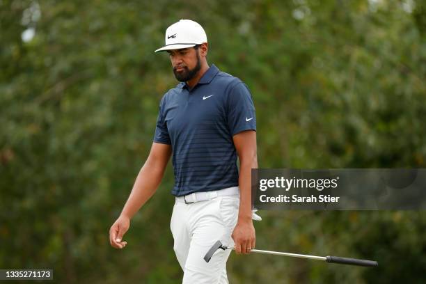 Tony Finau of the United States walks off the 17th green during the second round of THE NORTHERN TRUST, the first event of the FedExCup Playoffs, at...