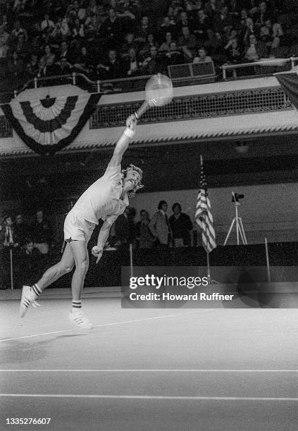 View of Australian tennis player John Newcombe in action during a match on the first day of the 62nd Davis Cup final, Cleveland, Ohio, November 30,...