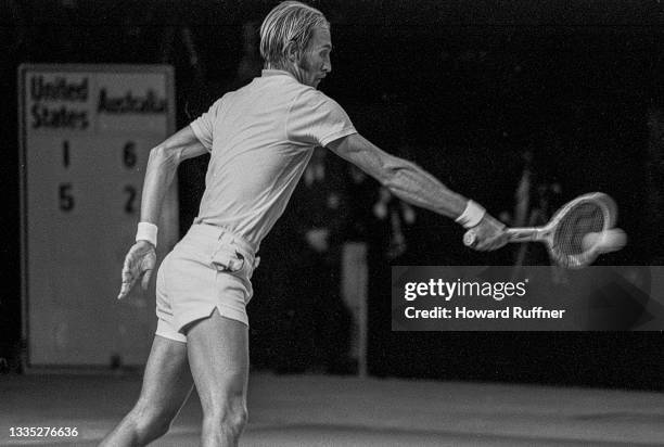 View of Australian tennis player John Newcombe in action during a match on the first day of the 62nd Davis Cup final, Cleveland, Ohio, November 30,...