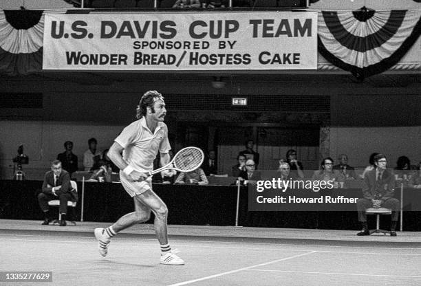 View of Australian tennis player John Newcombe in action during a match on the first day of the 62nd Davis Cup final, Cleveland, Ohio, November 30,...