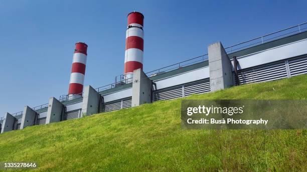 district heating thermal power plant in florence, italy - district heating stock-fotos und bilder