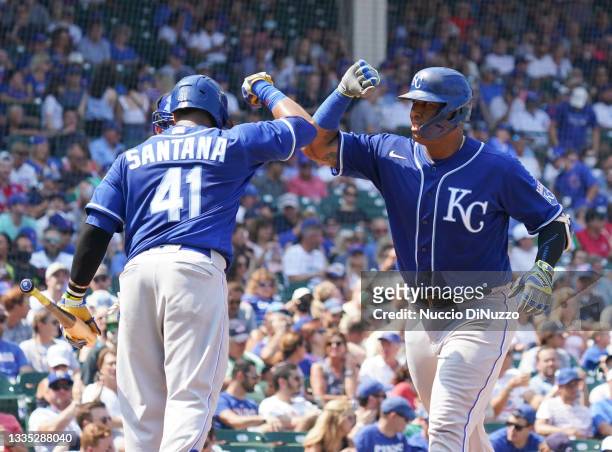 Salvador Perez of the Kansas City Royals is congratulated by Carlos Santana of the Kansas City Royals following his home run during the fourth inning...