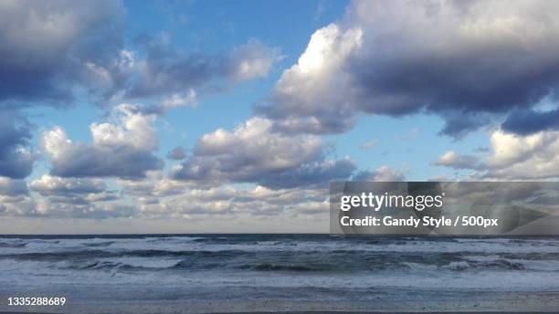 scenic view of sea against sky - décontamination photos et images de collection