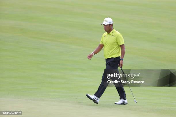 Hideki Matsuyama of Japan walks the 13th hole during the second round of THE NORTHERN TRUST, the first event of the FedExCup Playoffs, at Liberty...