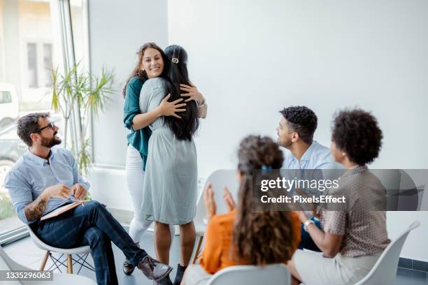 psychological support during group therapy - addiction stock pictures, royalty-free photos & images