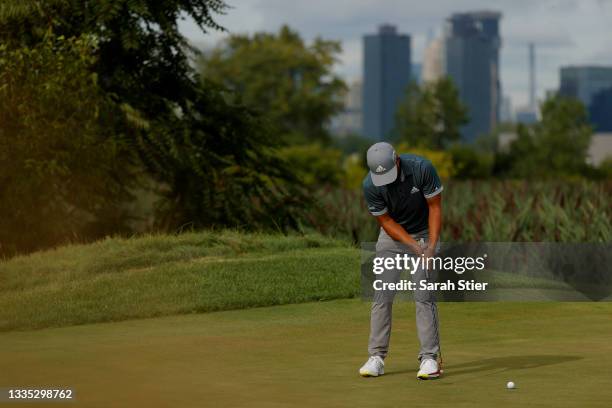 Xander Schauffele of the United States putts on the 14th green during the second round of THE NORTHERN TRUST, the first event of the FedExCup...