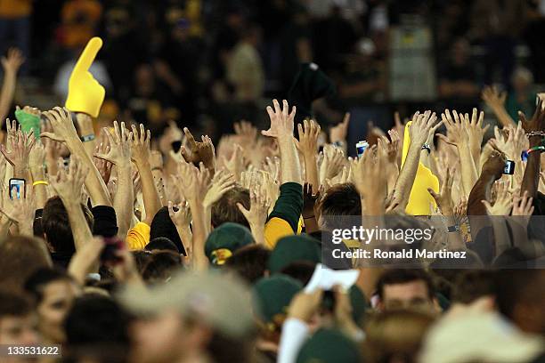 Baylor Bears students rush the field after a 48-35 win against the Oklahoma Sooners at Floyd Casey Stadium on November 19, 2011 in Waco, Texas.