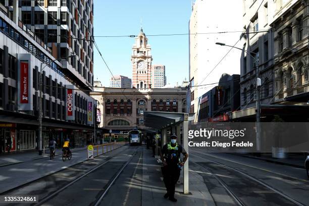 Heavy Victoria Police presence is seen as anti-lockdown protesters take to the streets on August 21, 2021 in Melbourne, Australia. Anti-lockdown...