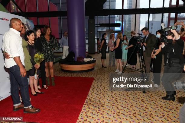 Joe Holt, DL Sams, writer/director Ann Hu, Yi Liu, and Robyn Payne attend the "Confetti" movie premiere at AMC Empire Times Square on August 20, 2021...