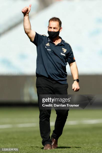 Hawthorn Senior coach Alastair Clarkson walks on the field before the round 23 AFL match between Richmond Tigers and Hawthorn Hawks at Melbourne...