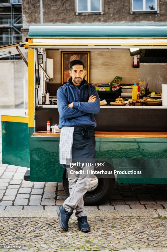 Portrait Of Food Truck Owner With Arms Folded