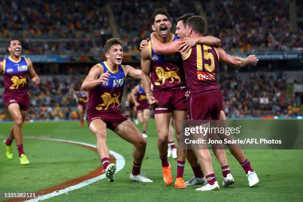 Charlie Cameron of the Lions celebrates a goal at the horn during the round 23 AFL match between Brisbane Lions and West Coast Eagles at The Gabba on...