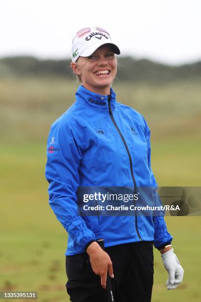 Madelene Sagstrom of Sweden laughs on the driving range during Day Three of the AIG Women's Open at Carnoustie Golf Links on August 21, 2021 in...