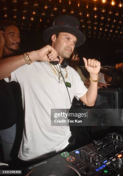 Street Artist Alec Monopoly aka Alec Andon performs during the Alec Monopoly X Belart After Party at VIP Room Saint Tropez on August 20, 2021 in...