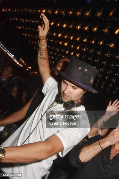 Street Artist Alec Monopoly aka Alec Andon performs during the Alec Monopoly X Belart After Party at VIP Room Saint Tropez on August 20, 2021 in...