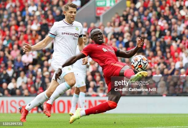Sadio Mane of Liverpool shoots during the Premier League match between Liverpool and Burnley at Anfield on August 21, 2021 in Liverpool, England.