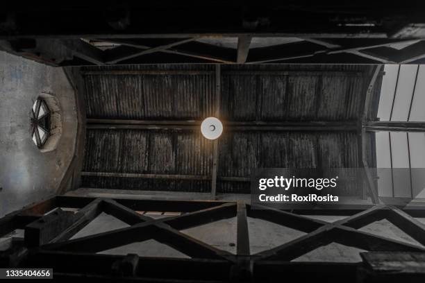 wooden ceiling of an old abandoned jail - attic storage stockfoto's en -beelden