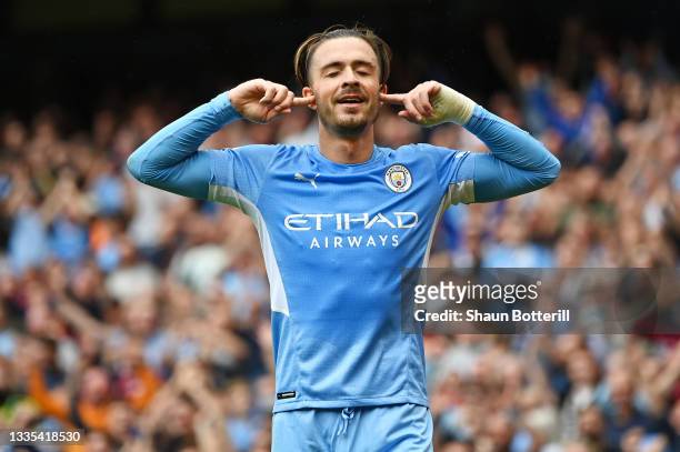 Jack Grealish of Manchester City celebrates after scoring their side's second goal during the Premier League match between Manchester City and...