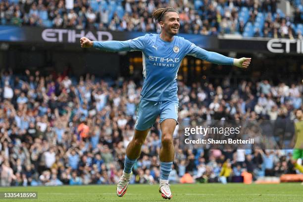 Jack Grealish of Manchester City celebrates after scoring their side's second goal during the Premier League match between Manchester City and...