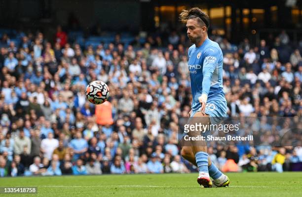 Jack Grealish of Manchester City scores their side's second goal during the Premier League match between Manchester City and Norwich City at Etihad...