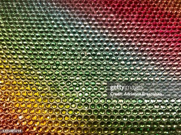 rainbow of rhinestones - diamante stock-fotos und bilder