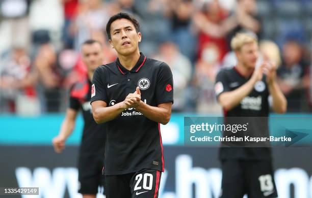 Makoto Hasebe of Eintracht Frankfurt applauds the fans following the Bundesliga match between Eintracht Frankfurt and FC Augsburg at Deutsche Bank...