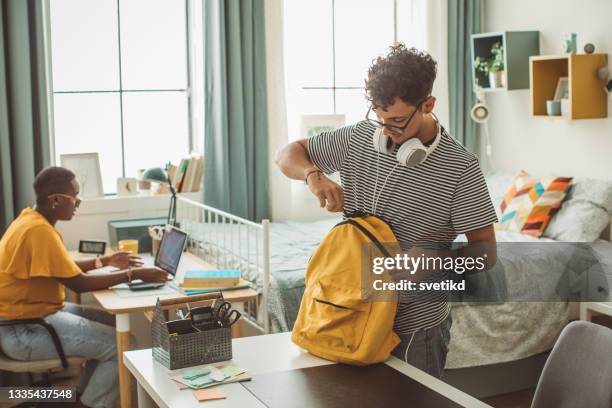 friends at college dorm room - student accommodation stock pictures, royalty-free photos & images