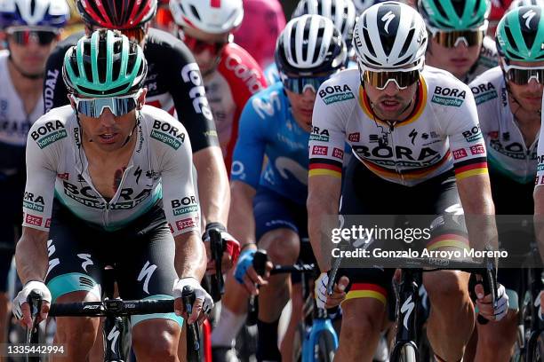 Cesare Benedetti of Italy and Maximilian Schachmann of Germany and Team Bora - Hansgrohe compete during the 76th Tour of Spain 2021, Stage 8 a 173,7...