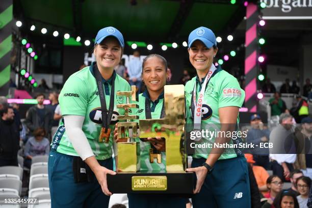 Dane van Niekerk, Shabnim Ismail and Marizanne Kapp pose following The Hundred Final match between Southern Brave Women and Oval Invincibles Women at...