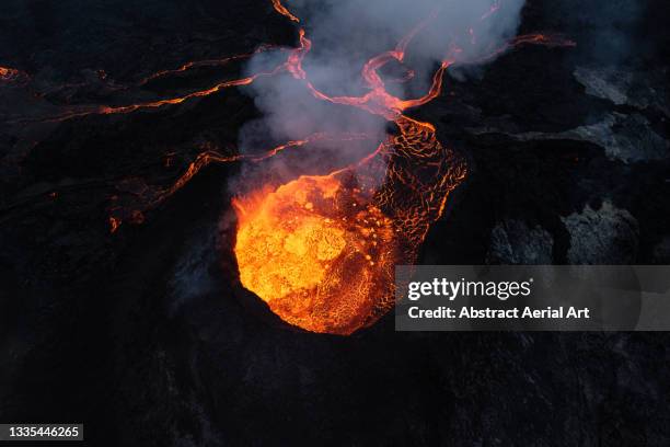 high angle view of fagradalsfjall volcano, reykjanes peninsula, iceland - volcanic crater stock-fotos und bilder