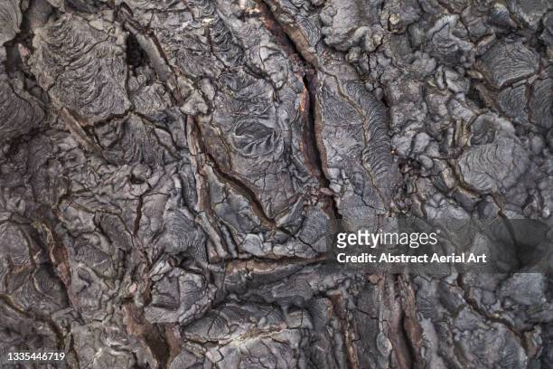 drone shot looking directly down on a cooling lava field, fagradalsfjall volcano, reykjanes peninsula, iceland - rock formation texture stock pictures, royalty-free photos & images