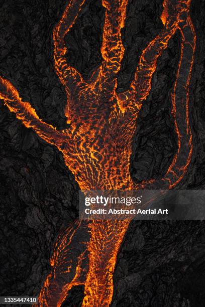 drone shot showing a hand shaped lava pattern, fagradalsfjall volcano, reykjanes peninsula, iceland - volcanic rock stock pictures, royalty-free photos & images