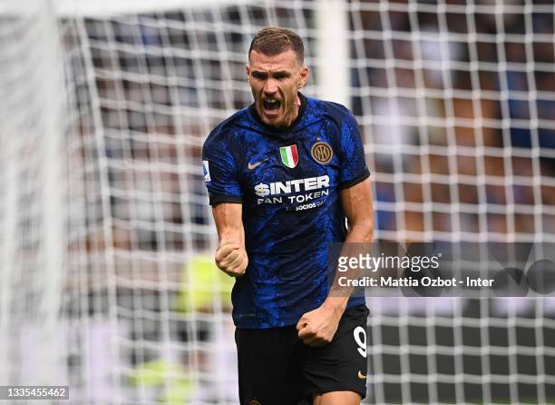 Edin Dzeko of FC Internazionale celebrates after scoring the fourth goal during the Serie A match between FC Internazionale v Genoa CFC at Stadio...