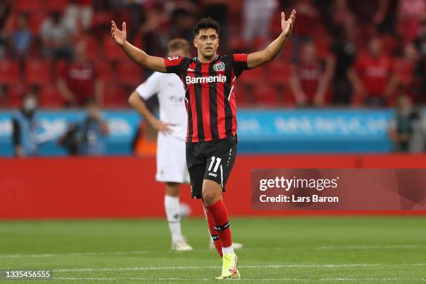 Nadiem Amiri of Bayer 04 Leverkusen celebrates after scoring their side's fourth goal during the Bundesliga match between Bayer 04 Leverkusen and...