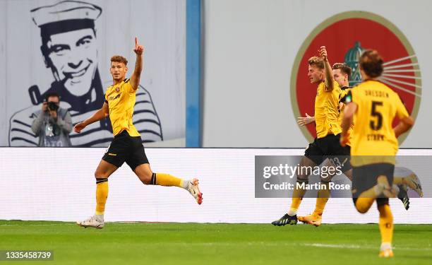 Heinz Moerschel of Dynamo Dresden celebrates after scoring their side's first goal during the Second Bundesliga match between FC Hansa Rostock and SG...