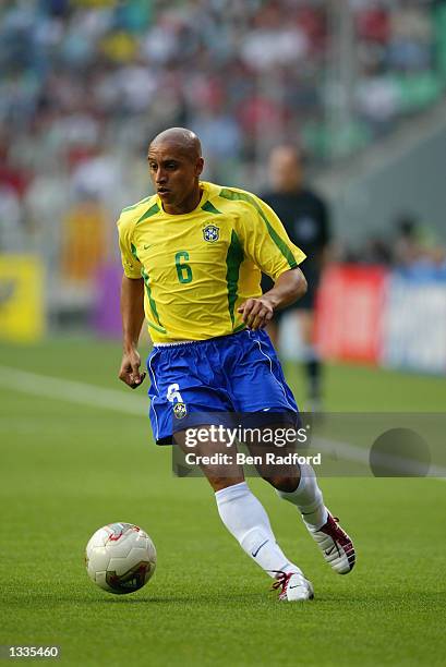 Roberto Carlos of Brazil runs with the ball during the Brazil v Turkey, Group C, World Cup Group Stage match played at the Ulsan-Munsu World Cup...