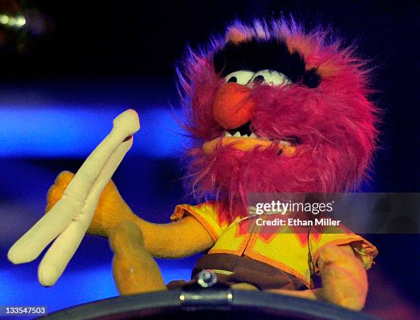 An Animal character from "The Muppet Show" is displayed on the drum kit of New Found Glory drummer Cyrus Bolooki during the Pop Punk's Not Dead tour...