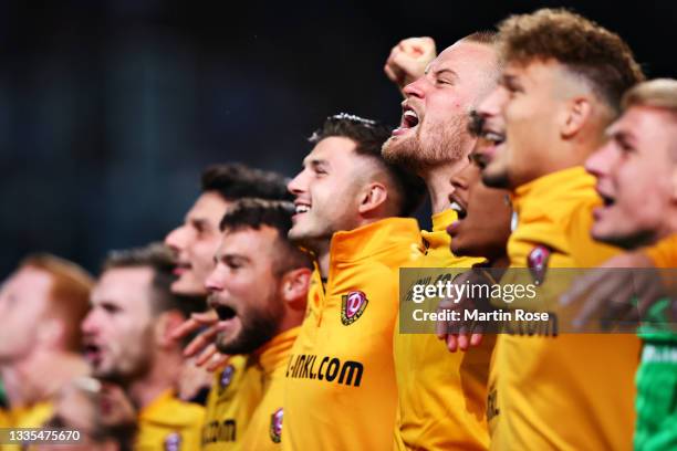 Sebastian Mai of Dynamo Dresden celebrates with his team and the fans following victory during the Second Bundesliga match between FC Hansa Rostock...