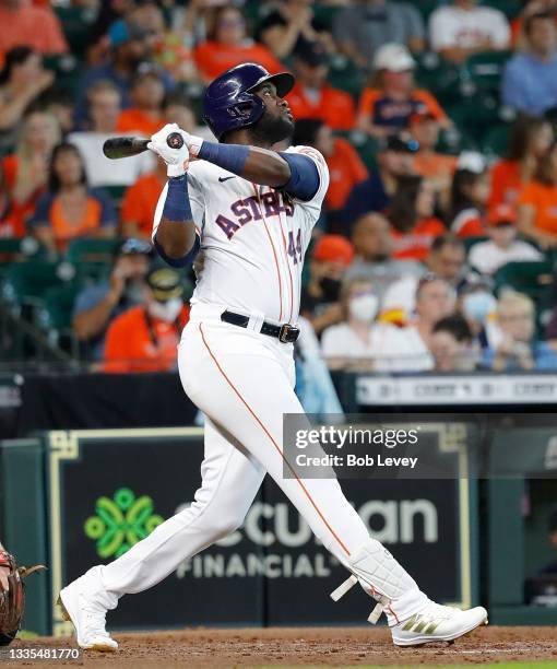 Yordan Alvarez of the Houston Astros hits a three run home run in the third inning against the Seattle Mariners at Minute Maid Park on August 21,...