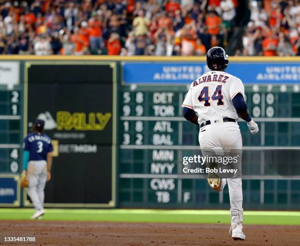 Yordan Alvarez of the Houston Astros hits a three run home run in the third inning against the Seattle Mariners at Minute Maid Park on August 21,...