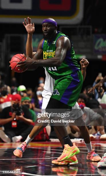 Reggie Evans of 3 Headed Monsters looks to pass against Ghost Ballers battle for a rebound during a BIG3 game in Week Eight at the Orleans Arena on...